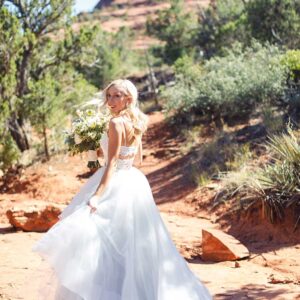 Mandy Collection Bride in front of the Red Rocks in Sedona, AZ