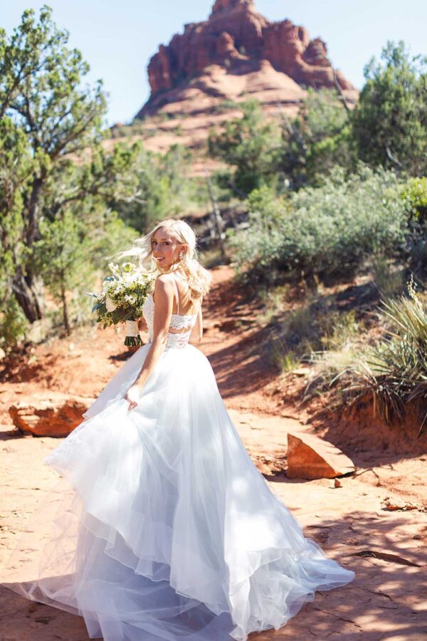 Mandy Collection Bride in front of the Red Rocks in Sedona, AZ